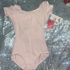 Girls leotard, pink size small.